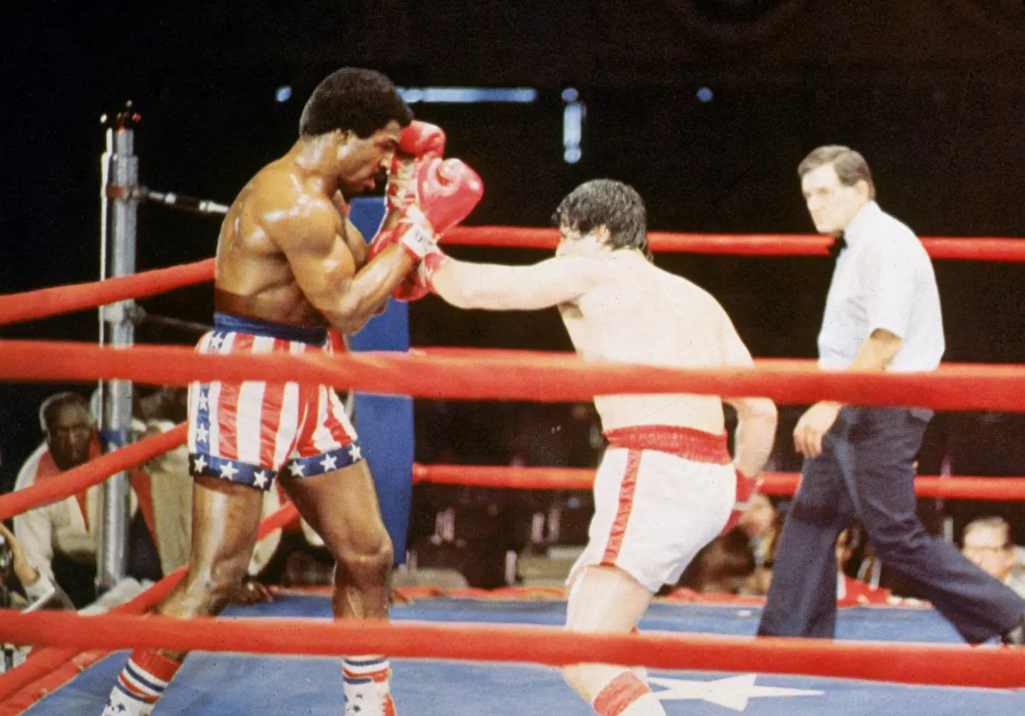 Weathers and Stallone as Apollo Creed and Rocky.