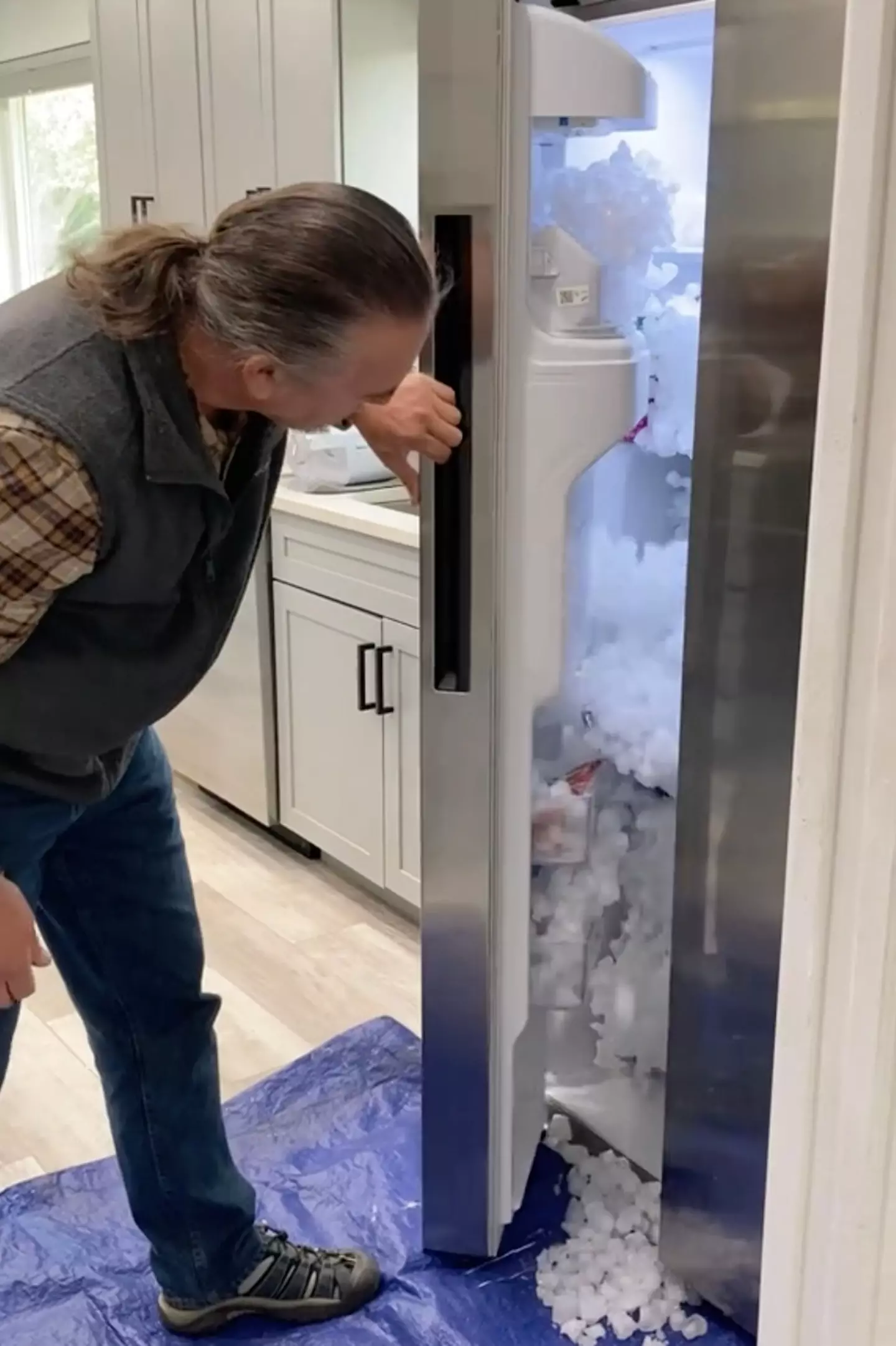 Sarah's dad had to prise open the door that was jammed shut with four months worth of ice cubes.