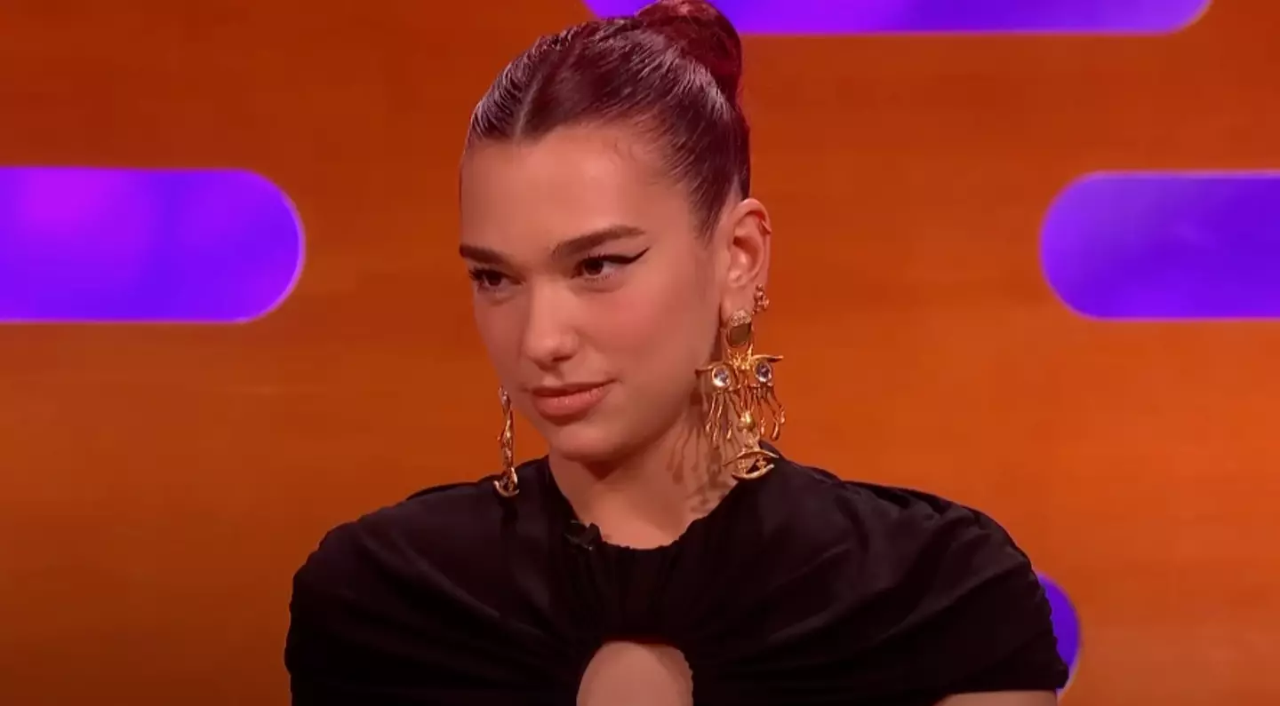 She initially looked a little reluctant to tell the couch (BBC)