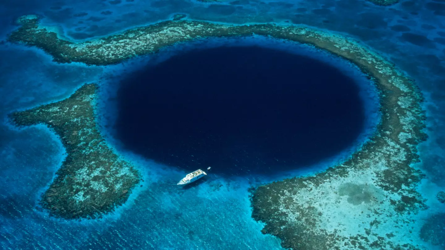 Scientists drilled sample from bottom of 400ft Great Blue Hole and uncovered 5,700 years of history