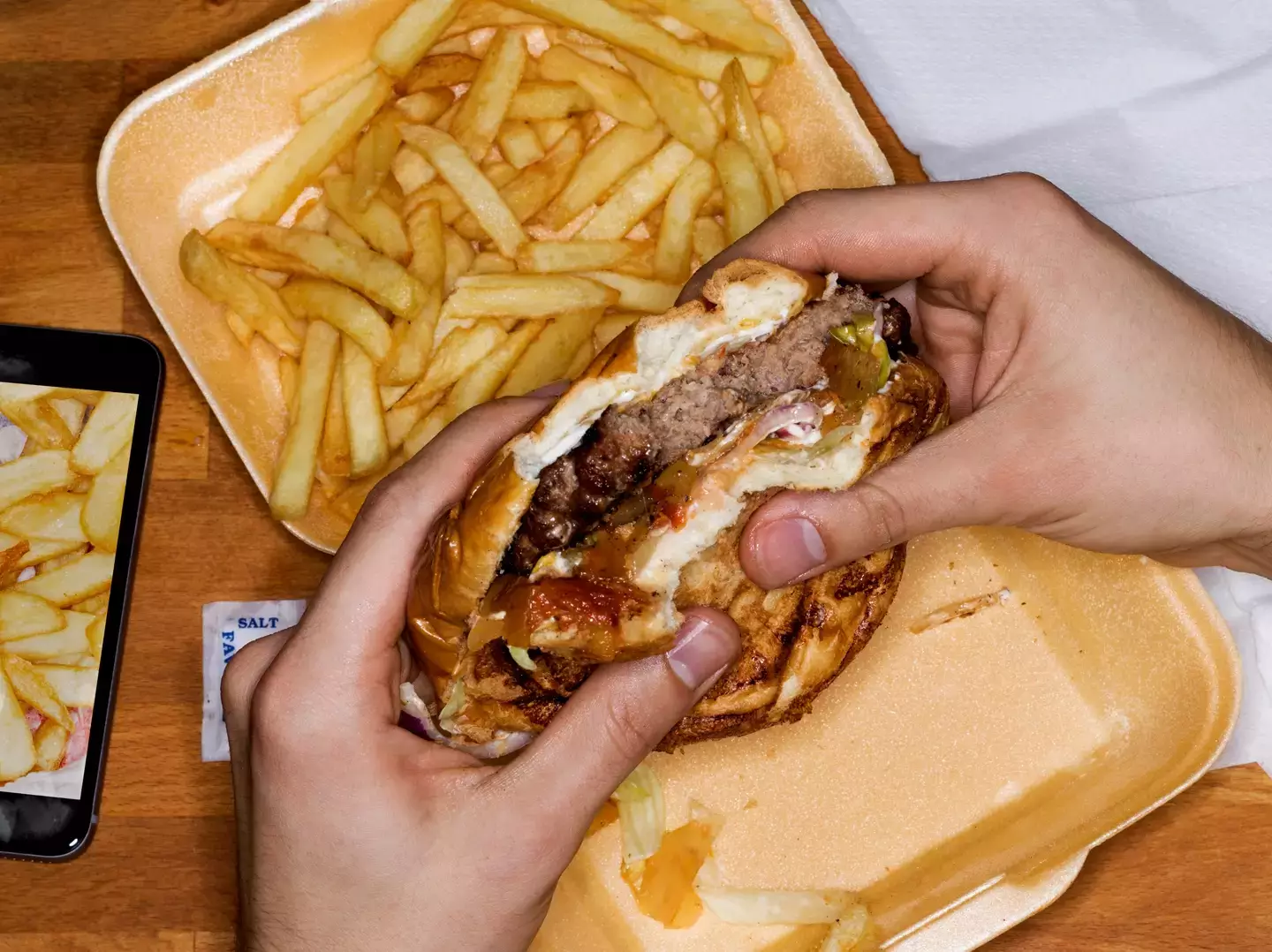 While it can be a lot easier to grab some junk food rather than cook a healthy meal, you could end up paying the price later on. (Getty Stock Image)