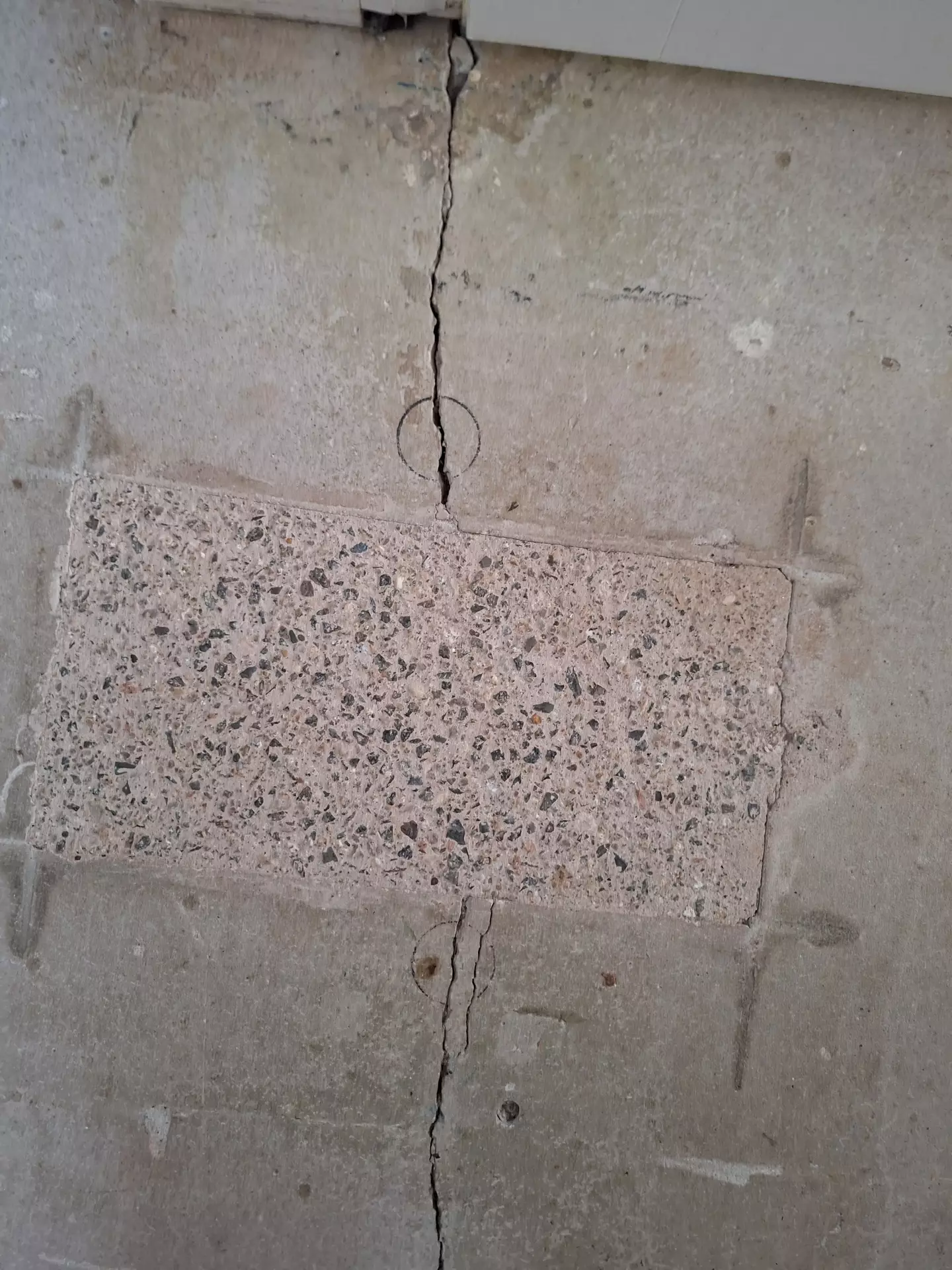 The couple say the flooring has been covered in cracks since they moved in (Kennedy News and Media)