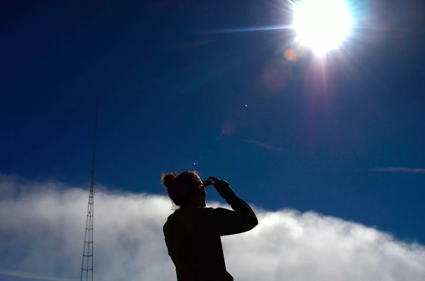 Protective glasses should always be used when looking at an eclipse. (Aaron McCoy/Getty Images)