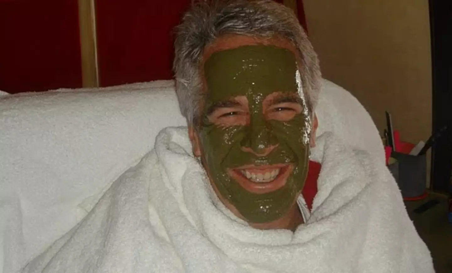 Epstein is seen sporting a green face mask in one of the images (Department of Justice)