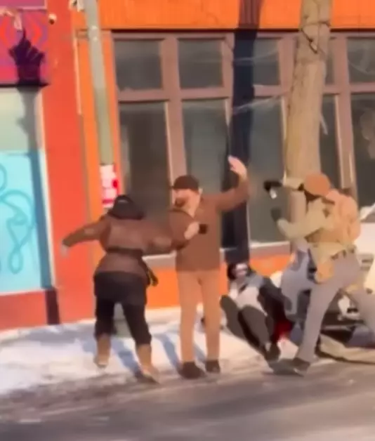 Pretti was shown in one video clutching his phone rather than a gun (NBC News)