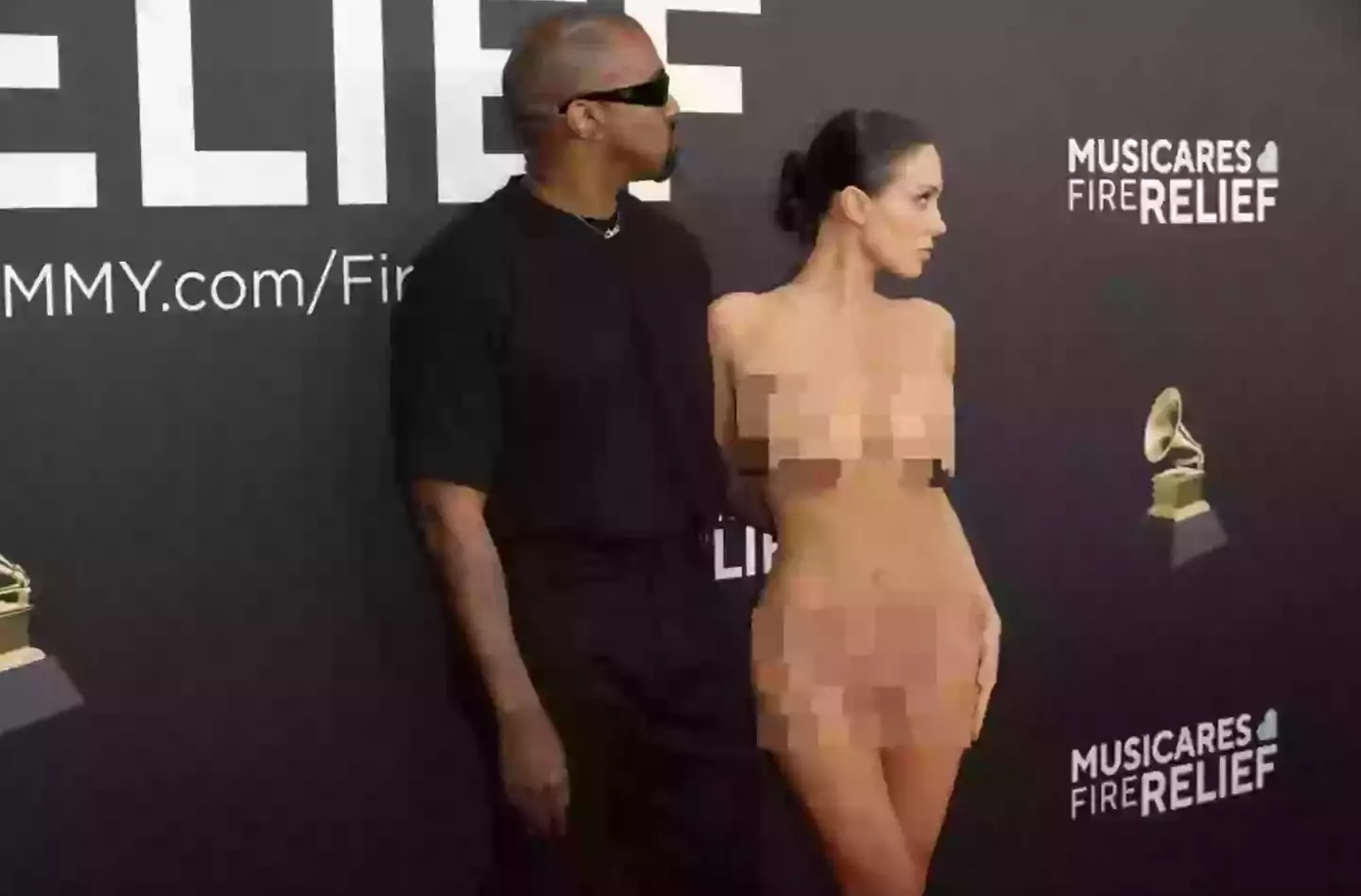 Censori didn't seem too bothered after being complimented on the dress (Frazer Harrison/Getty Images)