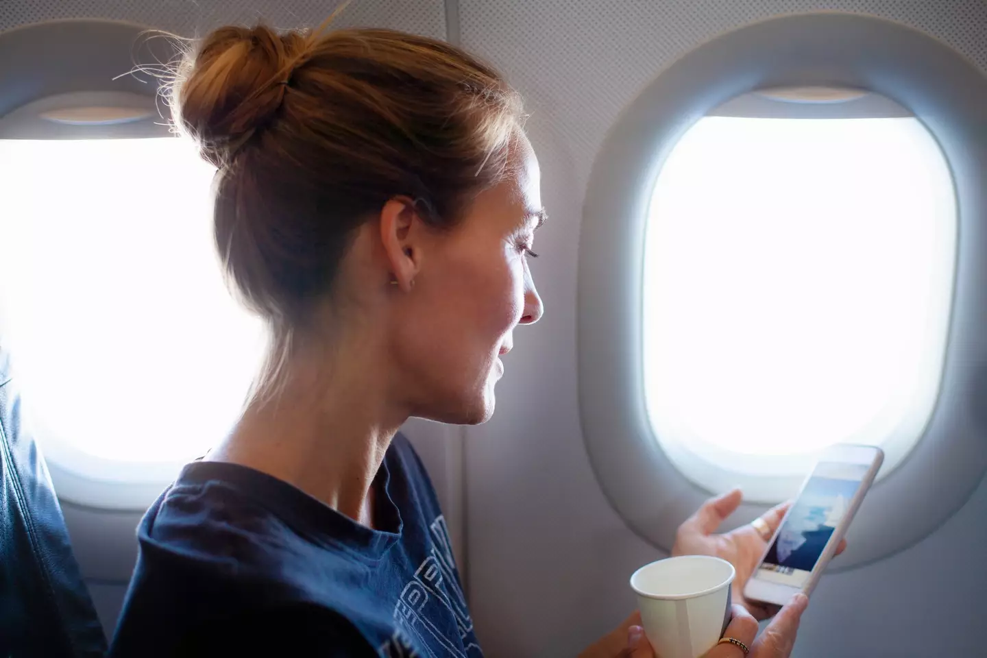 One former flight attendant has revealed what you should and shouldn't consume on a plane (Getty Stock Photo)