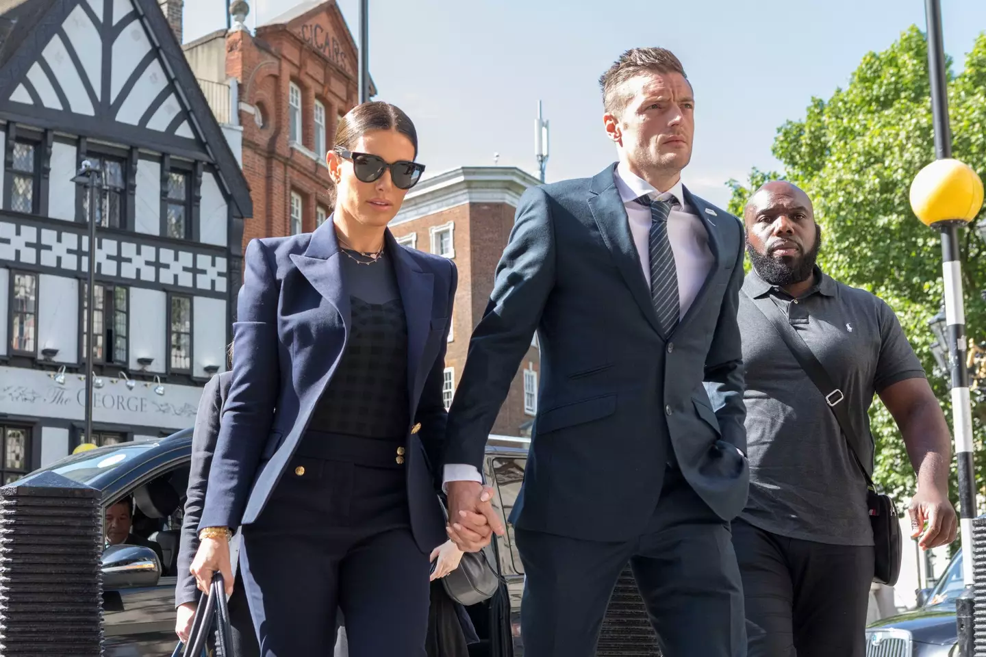 Rebekah Vardy and husband Jamie arriving at court.