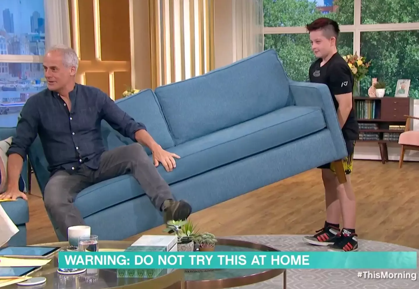 The 10-year-old demonstrated his strength on the This Morning sofa.