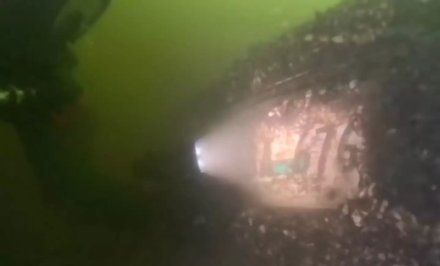 The divers then realised one of the vehicle's matched Miriam's license plate (YouTube/exploringwithnug)