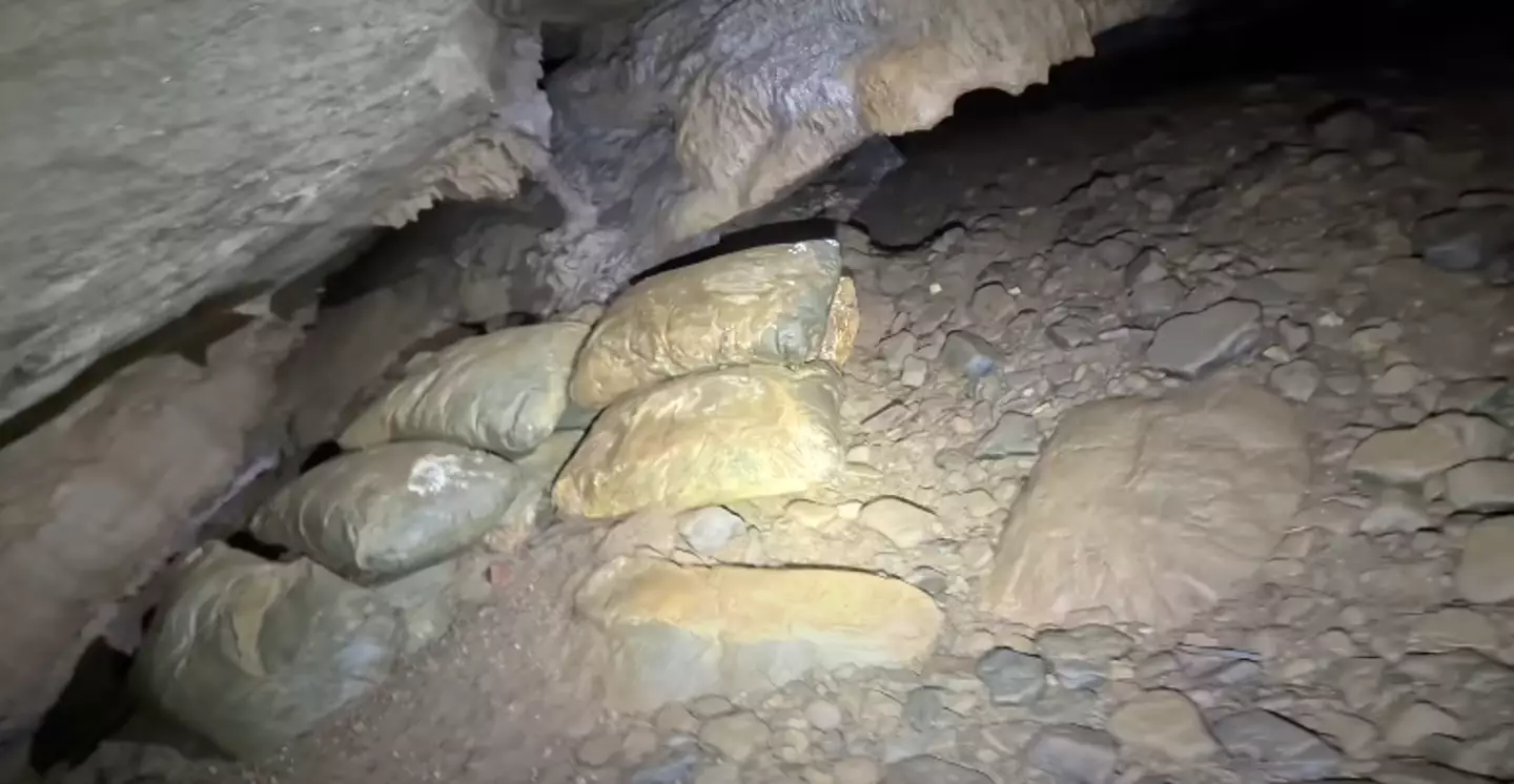 They randomly found some 'pillows' in the cave (YouTube/ActionAdventureTwins)