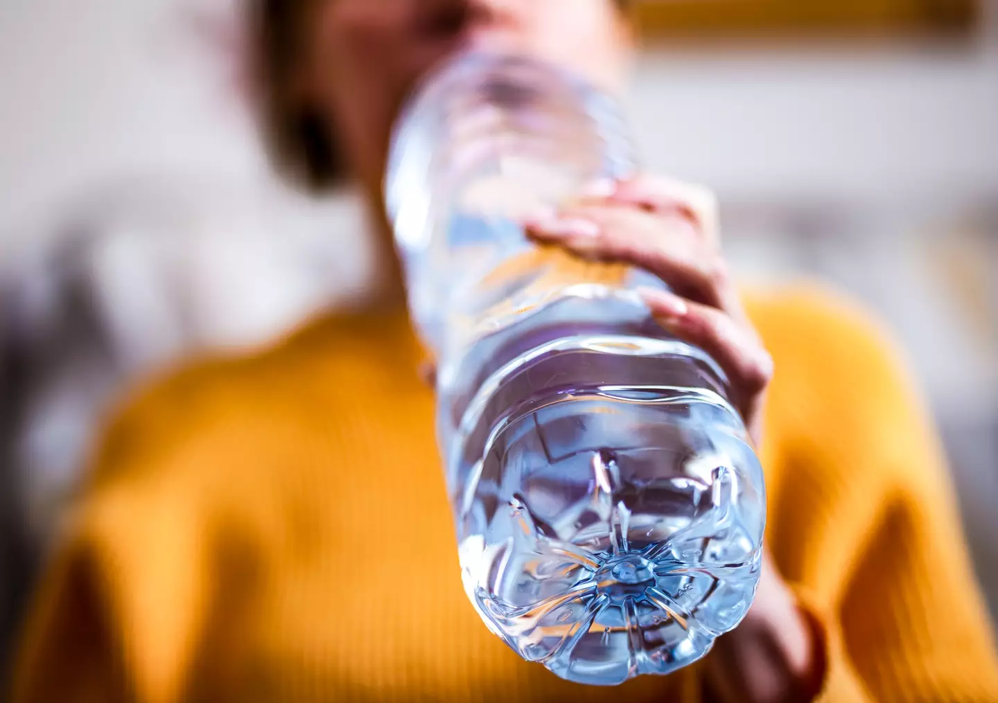 A couple of litres a day keeps the dehydration away (Getty Stock Image)