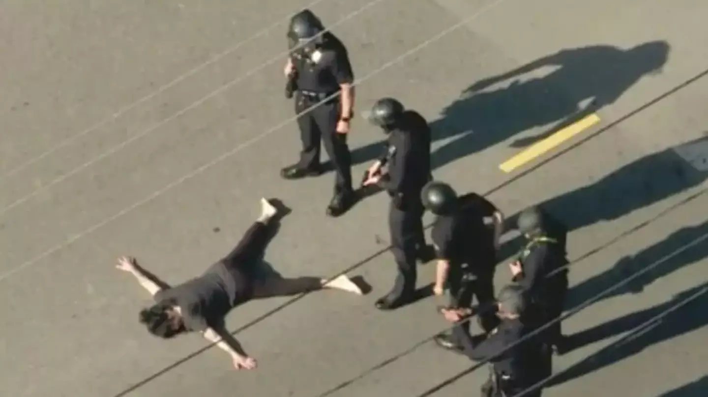 Officials say wife of Weezer bassist fired weapon at police before being shot and arrested as they reveal new details