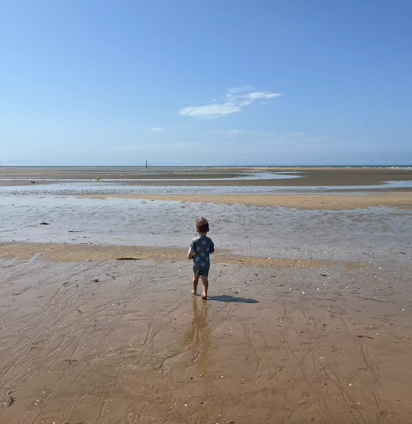 Normandy's sandy white beaches are a hit with families (LADbible)