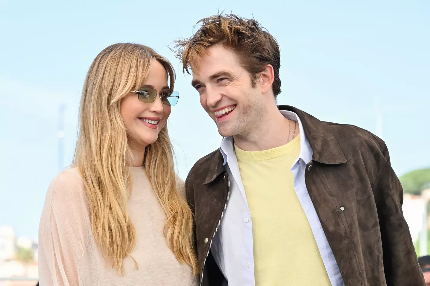 Jennifer Lawrence said she 'obviously' had to ask Robert Pattinson about what went down with his former girlfriend, Kristen Stewart (Stephane Cardinale - Corbis/Corbis via Getty Images)