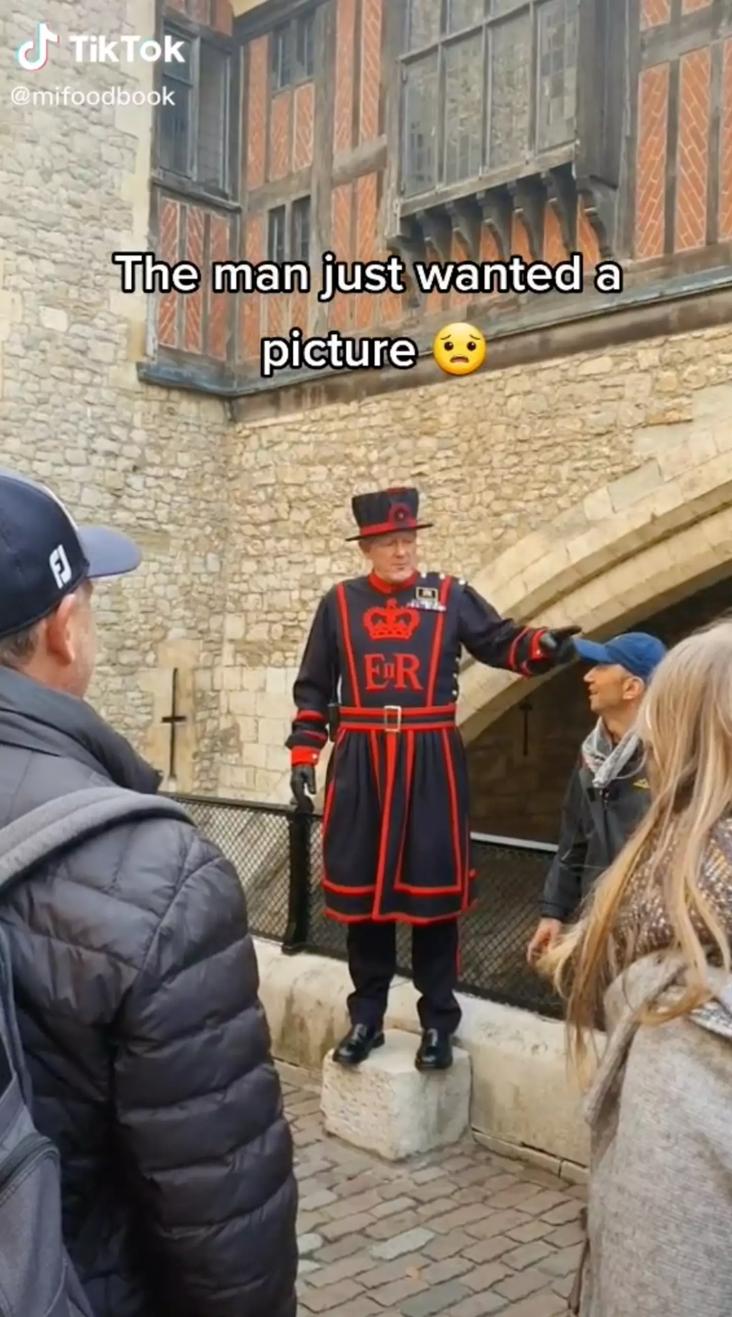 The Yeoman Warder sternly told the tourist to step back.