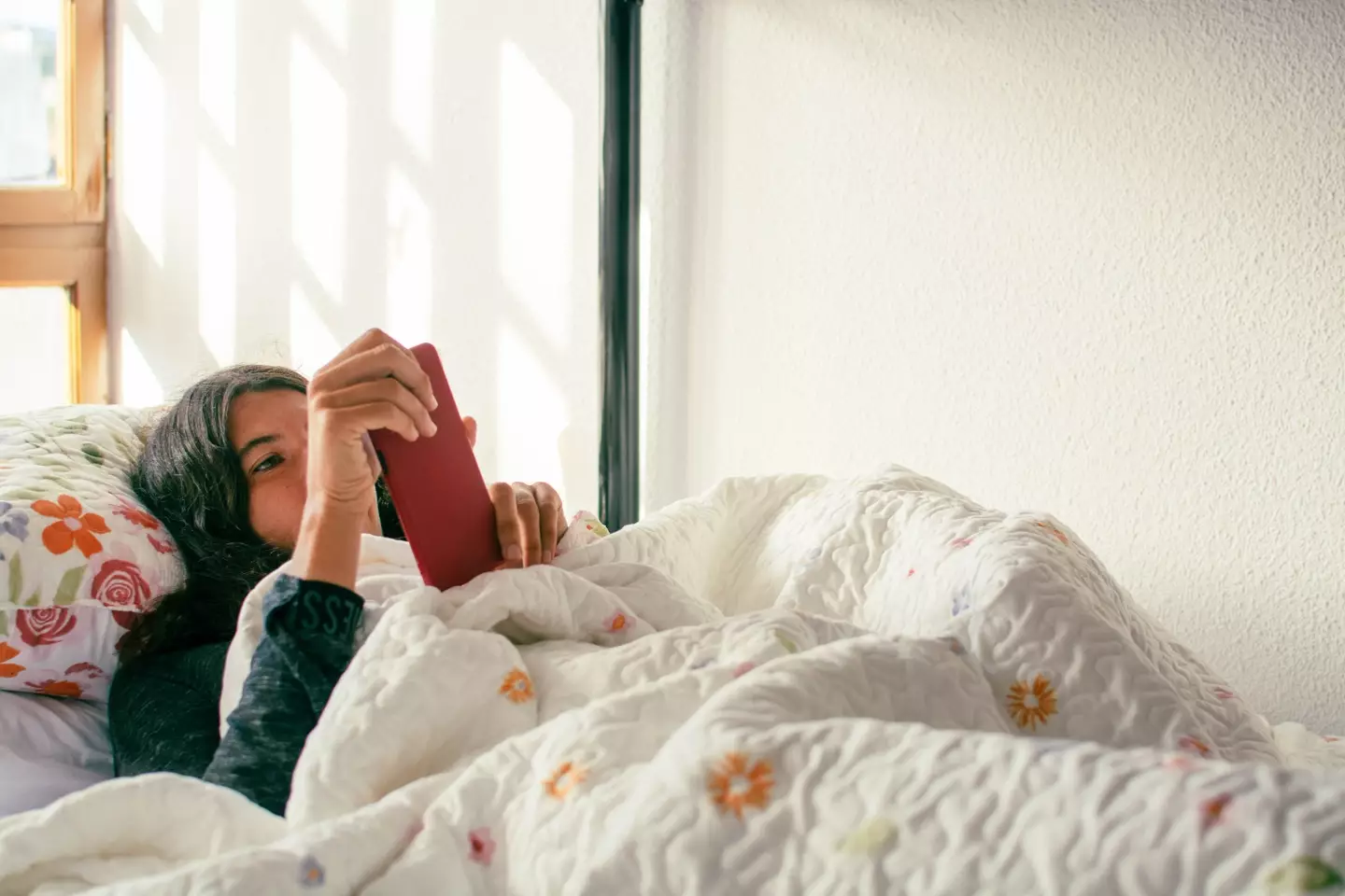 Staying in bed all day can bring on a number of health issues (Getty Stock Photo)