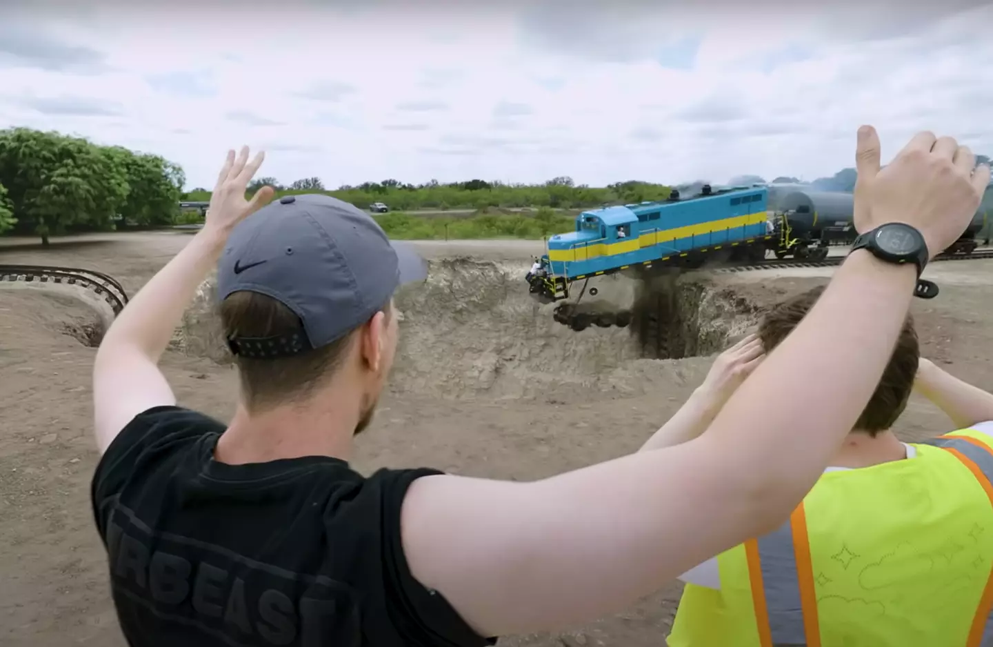 MrBeat's latest stunt saw him crash an actual train into a giant pit.