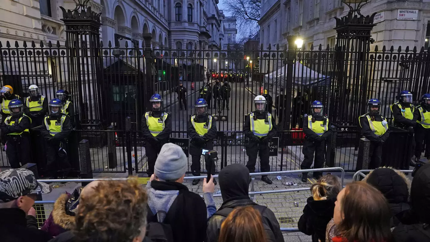 Anti-Vax Protesters Throw Flare Into Downing Street