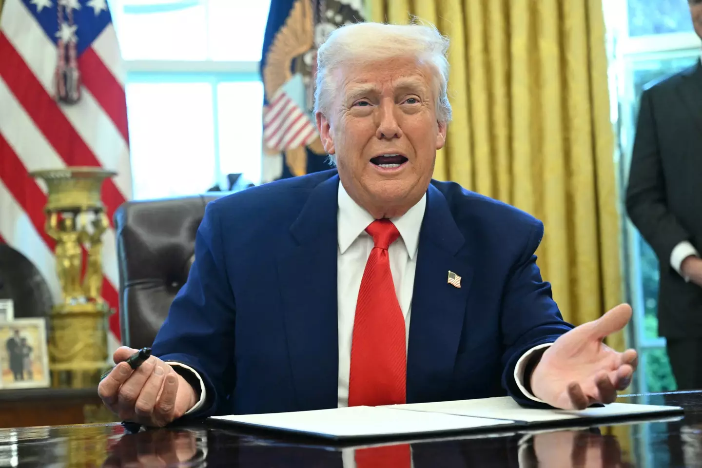 Trump signed the executive order on Wednesday, saying the former shower restrictions were 'ridiculous' (SAUL LOEB/AFP via Getty Images)