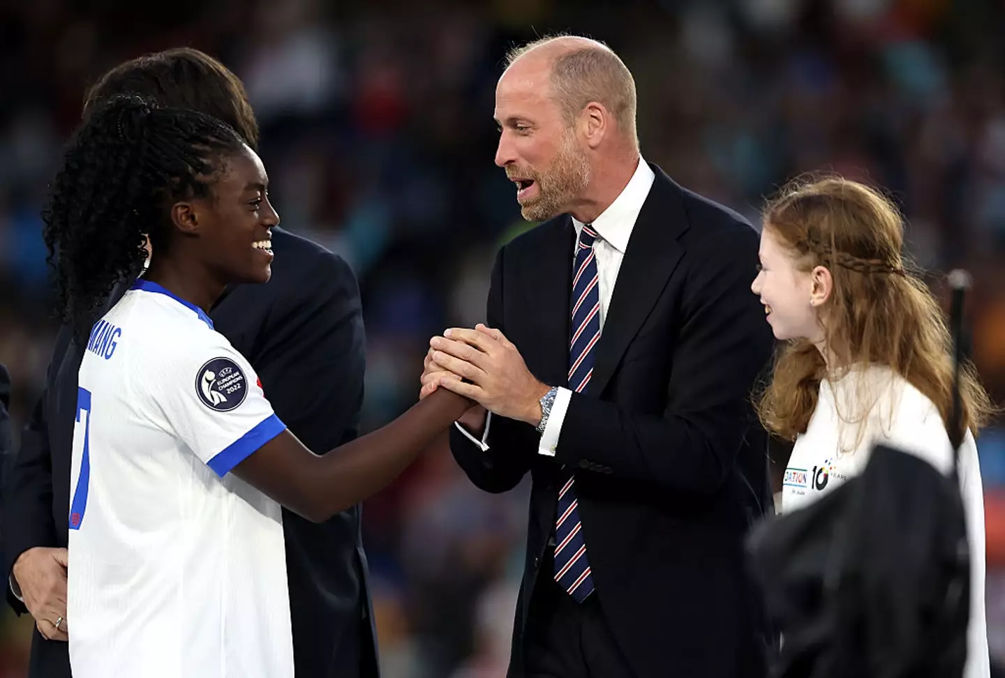 The 12-year-old was stood next to Prince William (Charlotte Wilson/Getty Images)