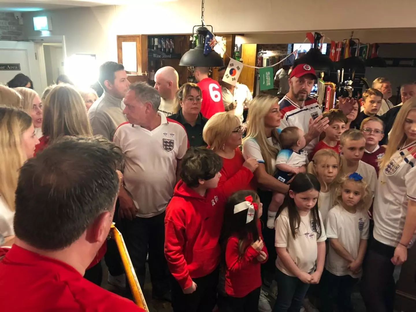 Crowds of England fans packed into a pub in the early hours of this morning.