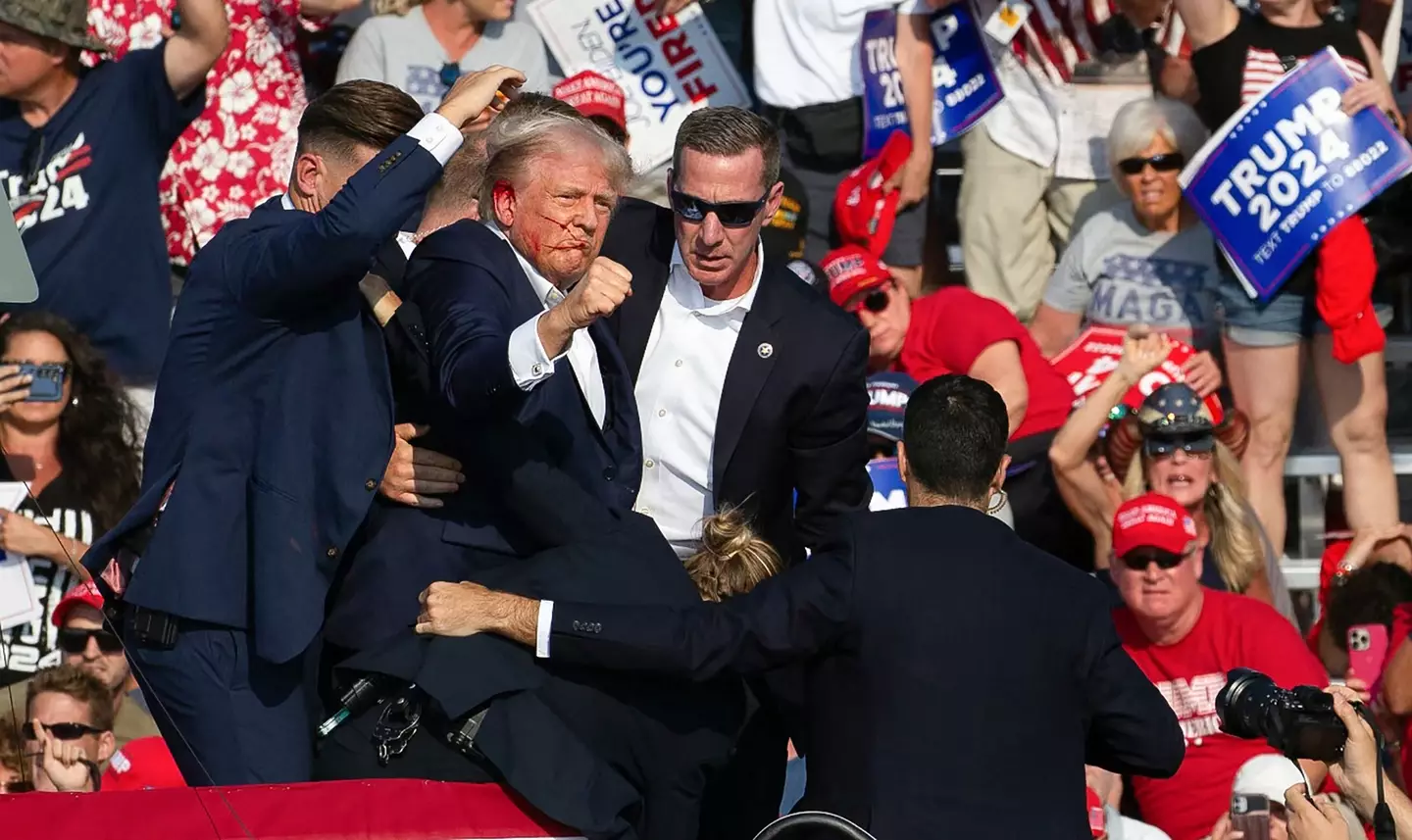 The gunman was able to get several shots off, and one person attending the rally was killed. (REBECCA DROKE/AFP via Getty Images)