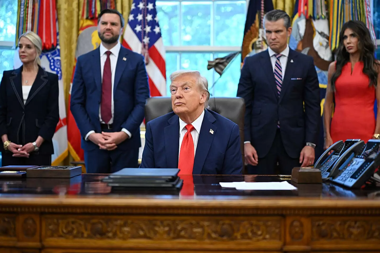 Trump signed the new bill in the Oval Office today (MANDEL NGAN/AFP via Getty Images)