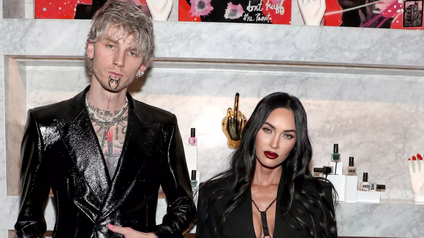 Machine Gun Kelly And Megan Fox Walk Red Carpet Linked By Their Nails