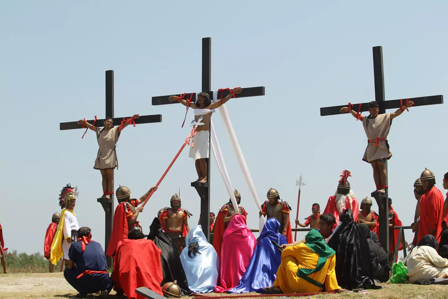 Ruben Enaje (centre) was nailed to the cross for the 36th time on Good Friday (NurPhoto/NurPhoto via Getty Images)