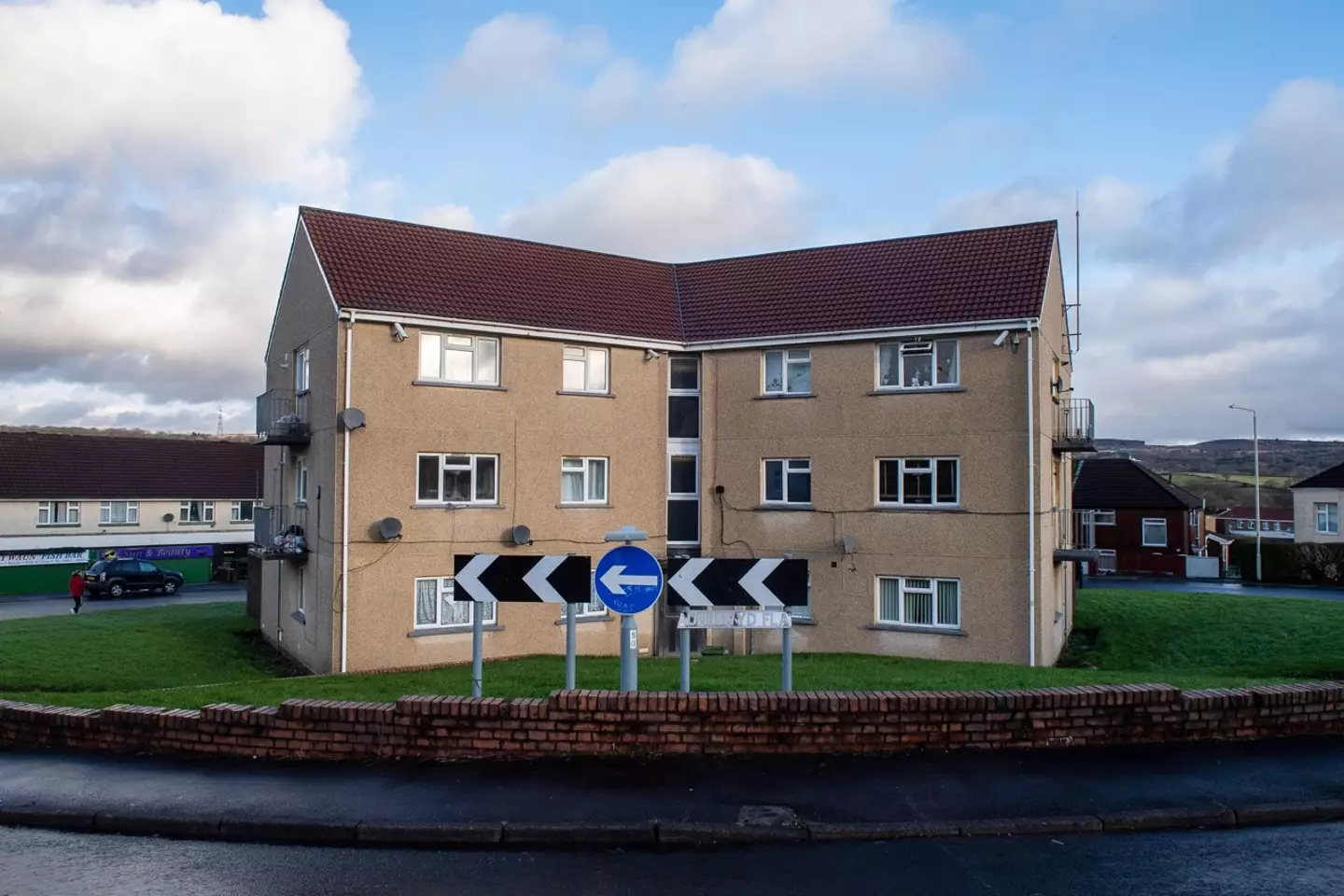 n the middle of the roundabout - which joins Lawrence Avenue to the west with Arfryn to the north and south - are the unmissable Waunllwyd flats.