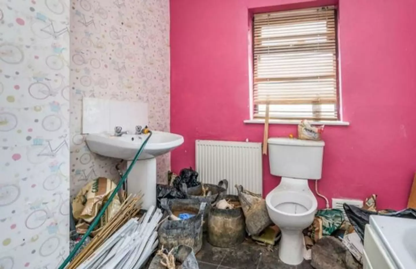 The bathroom was arguably the cleanest room in the house and boasted a vibrant colour scheme.