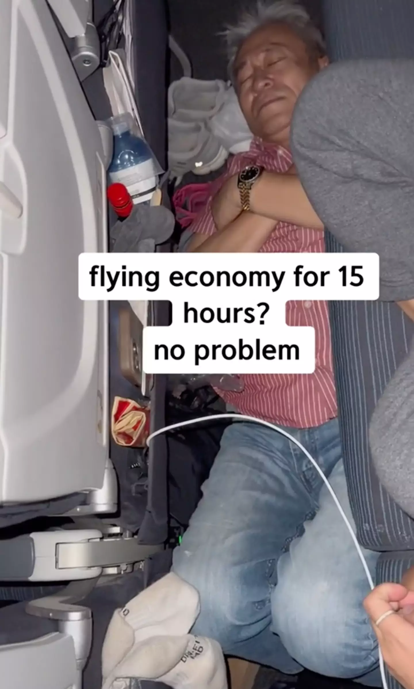 Natalie showed her dad sleeping on the floor of the plane in a viral TikTok video.