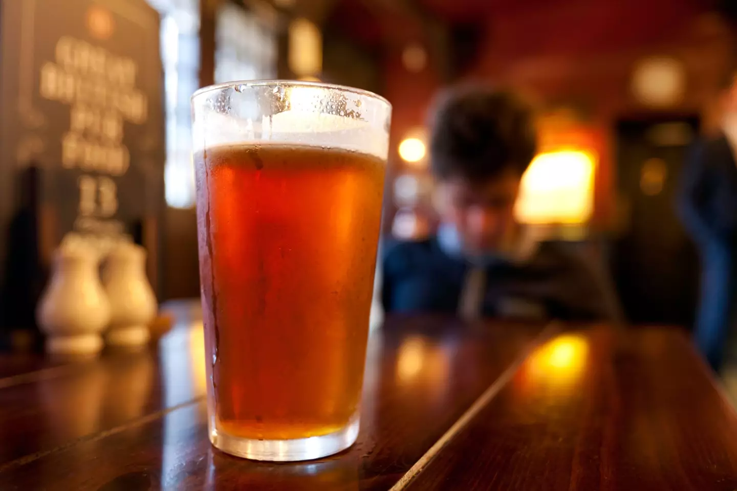 The average price of a pint of draught lager has gone down by 1p.