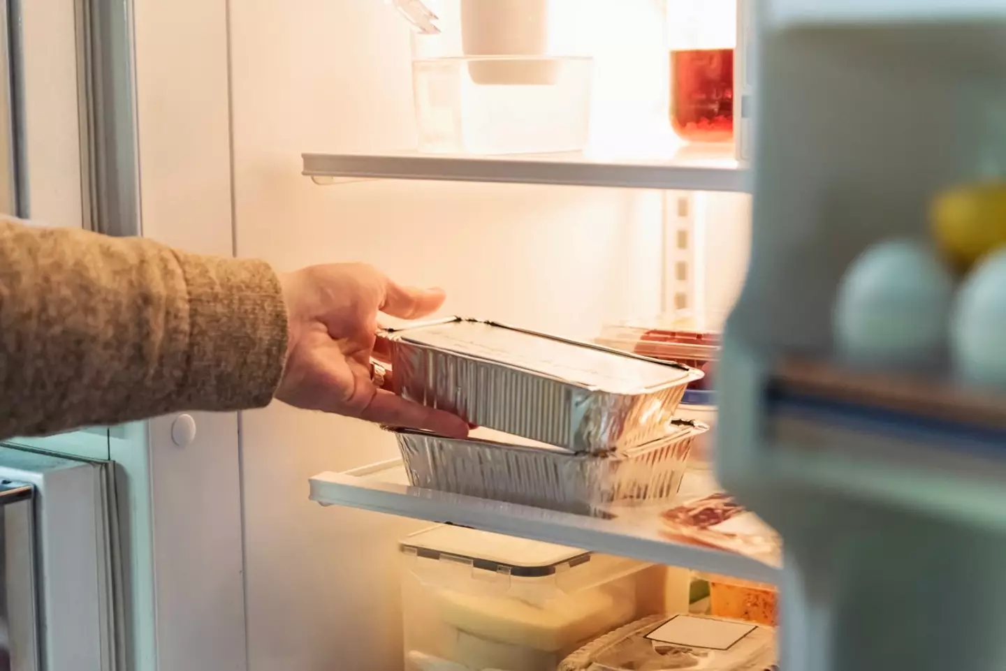 Is it right to put warm food straight in the fridge when you're wanting to store left overs?