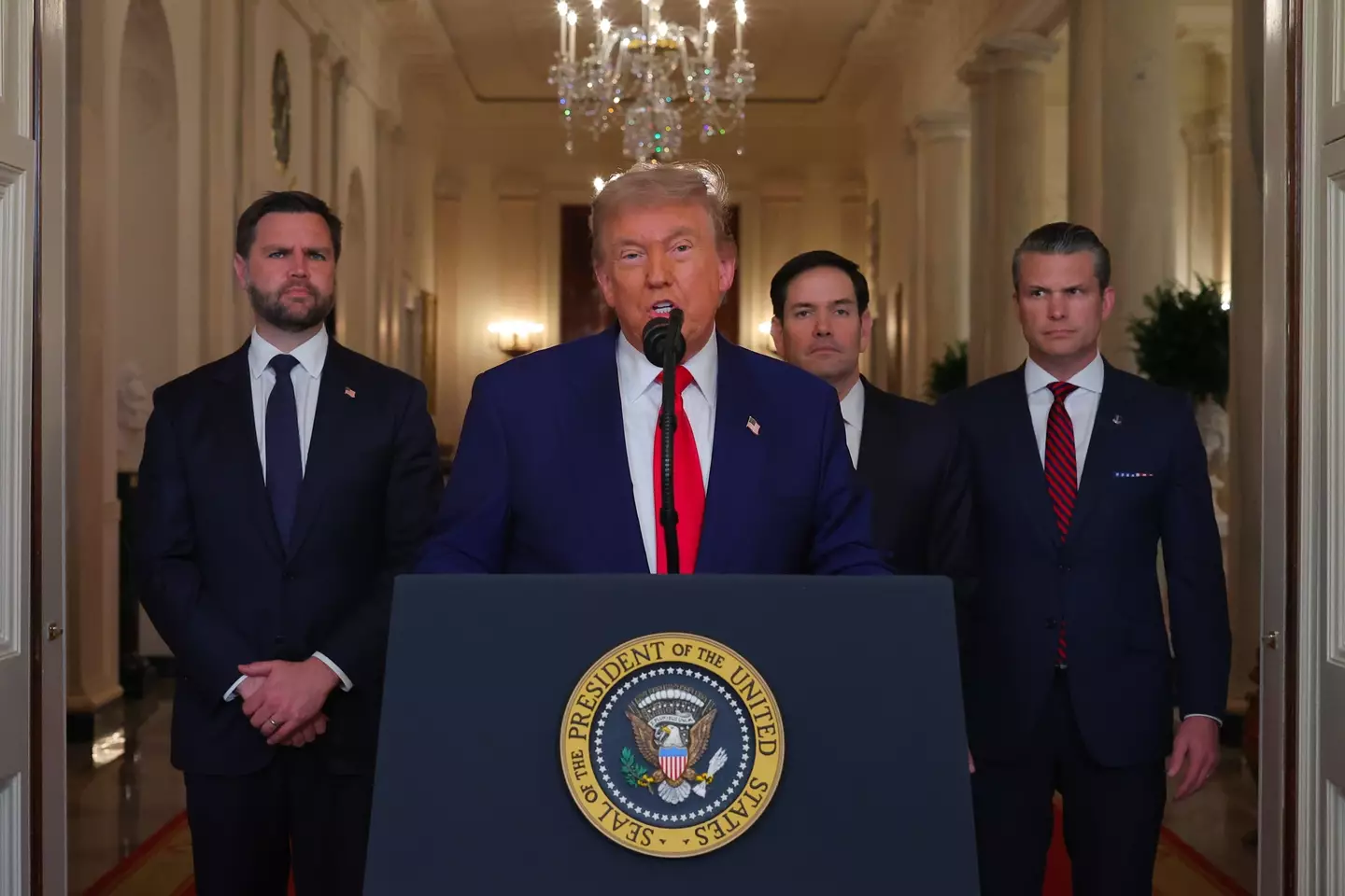 Trump seen addressing the nation in wake of the strikes alongside JD Vance (left) Marco Rubio and Pete Hegseth (Carlos Barria - Pool/Getty Images)