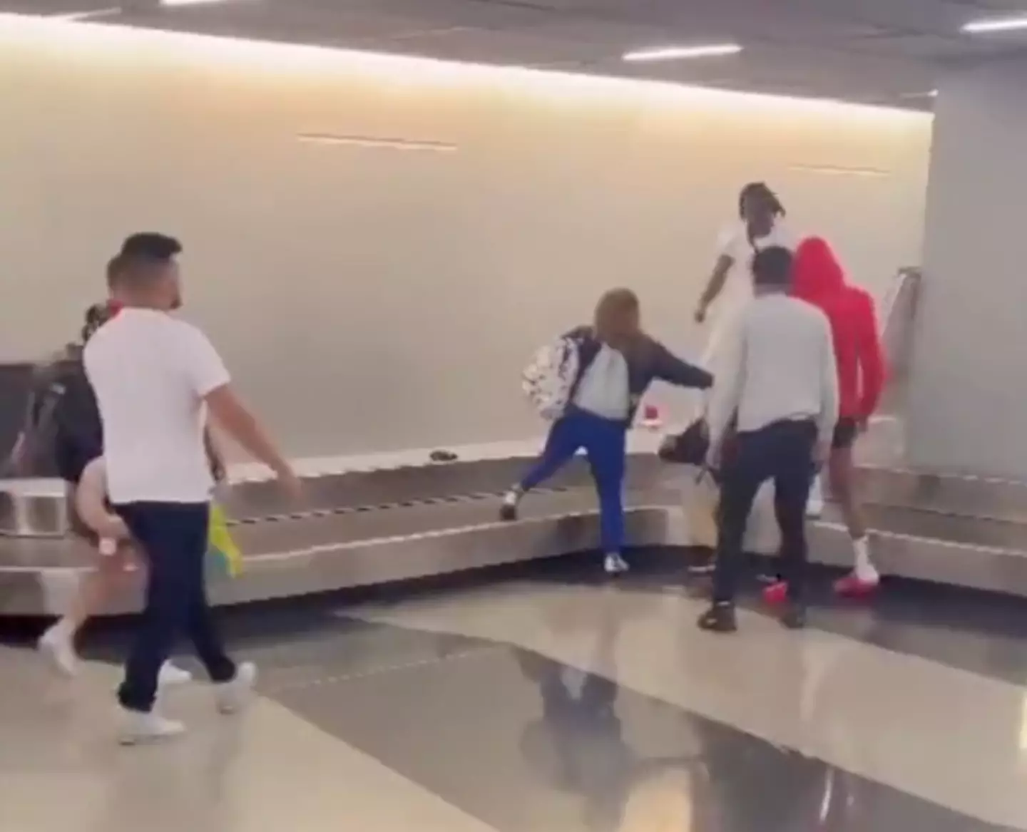 People were fighting on top of the conveyor belt.