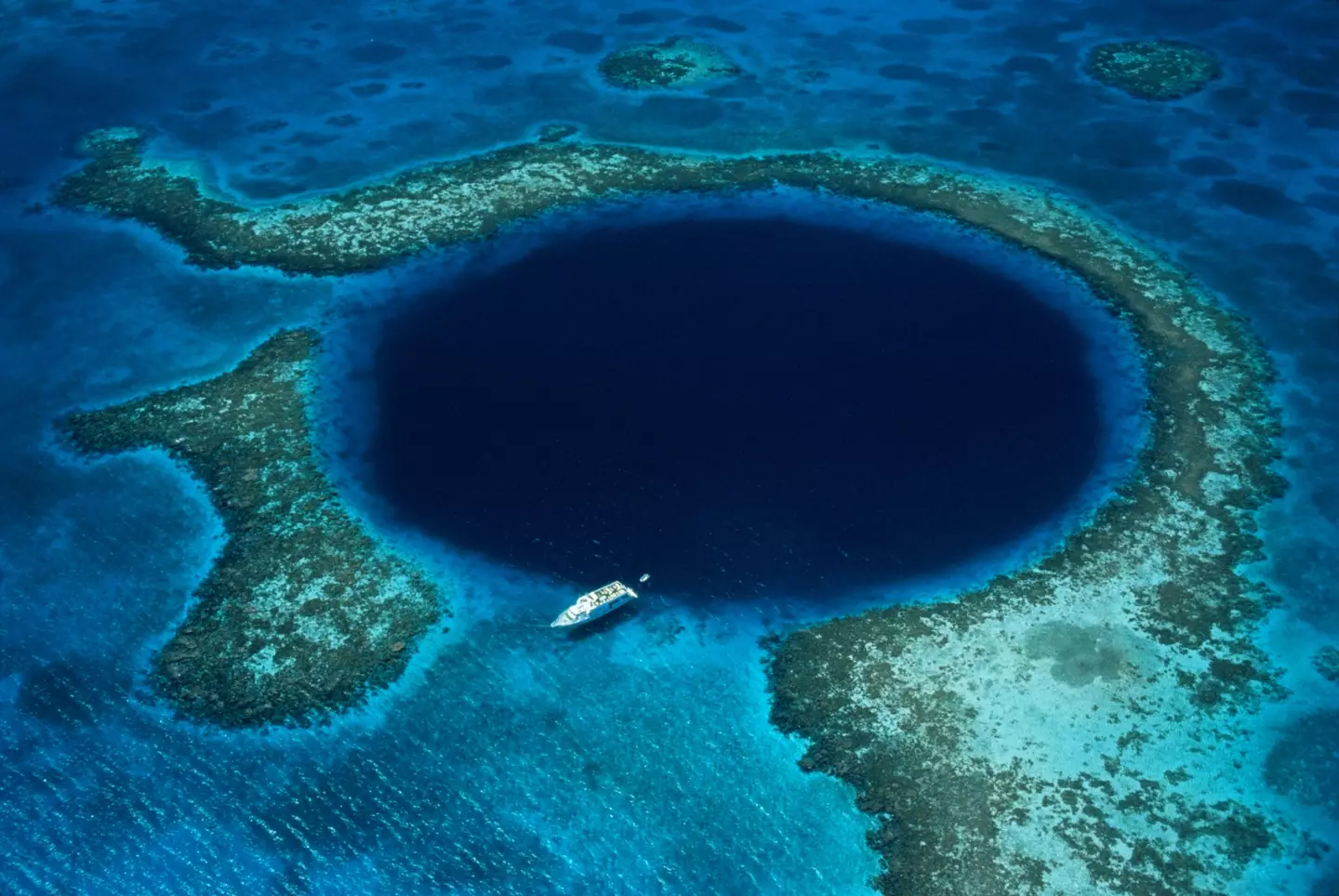The Great Blue Hole certainly earns its name by appearance alone.