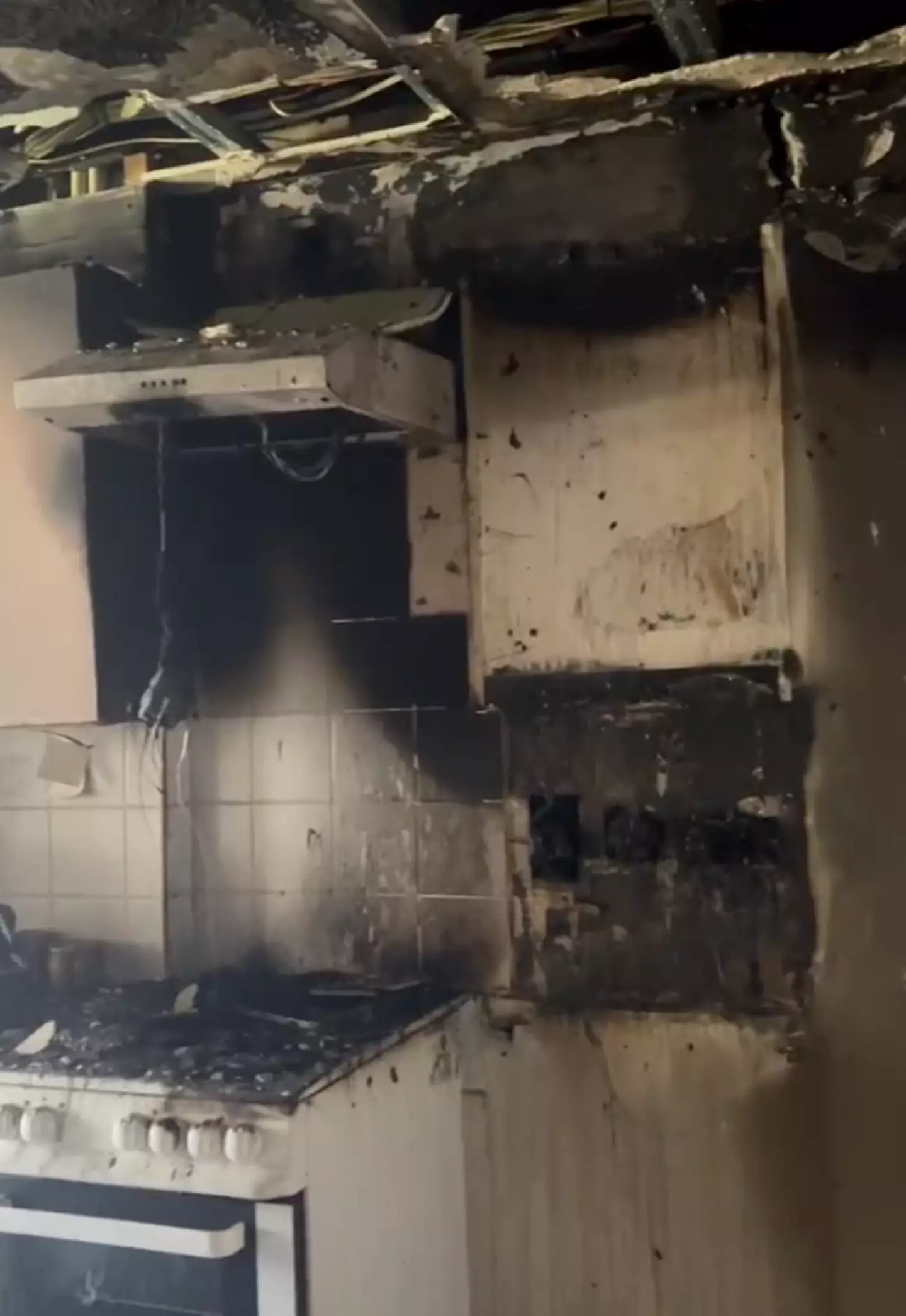 The kitchen was left black and burned by the fire.