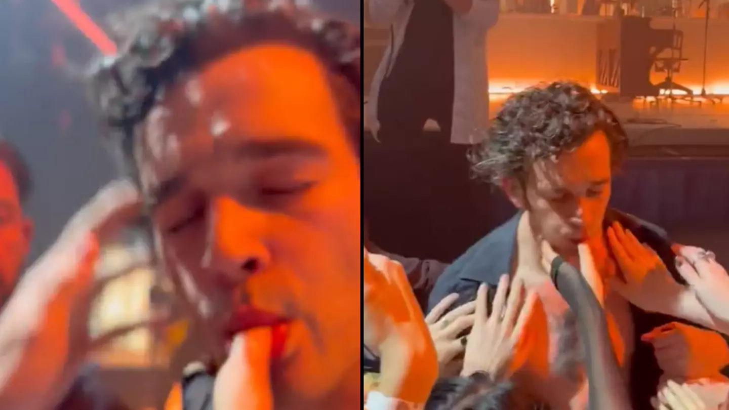 The 1975's Matt Healy french kisses fans and sucks on their fingers during gig