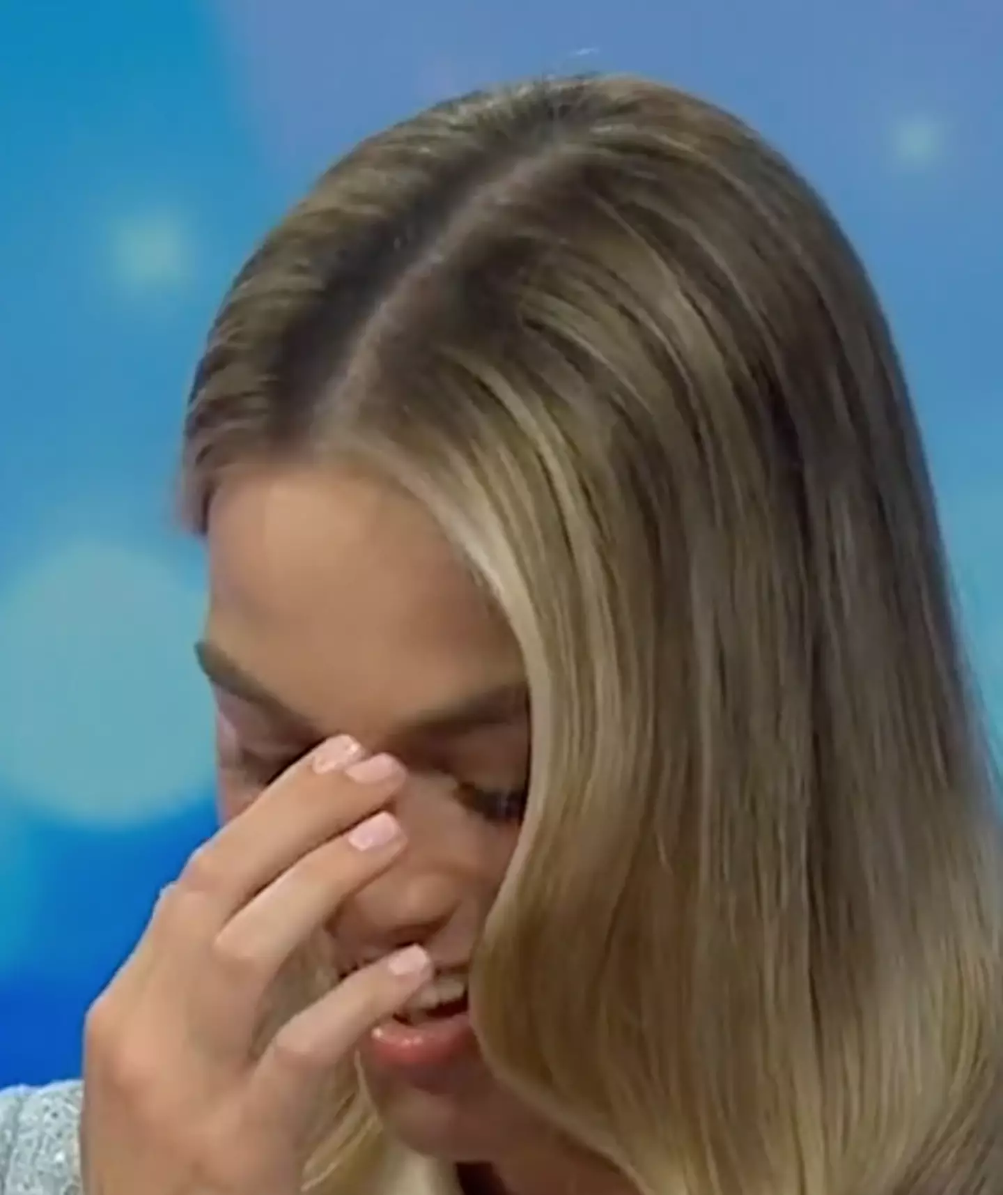 She couldn't help but hold her head in her hands after the hilarious blunder.