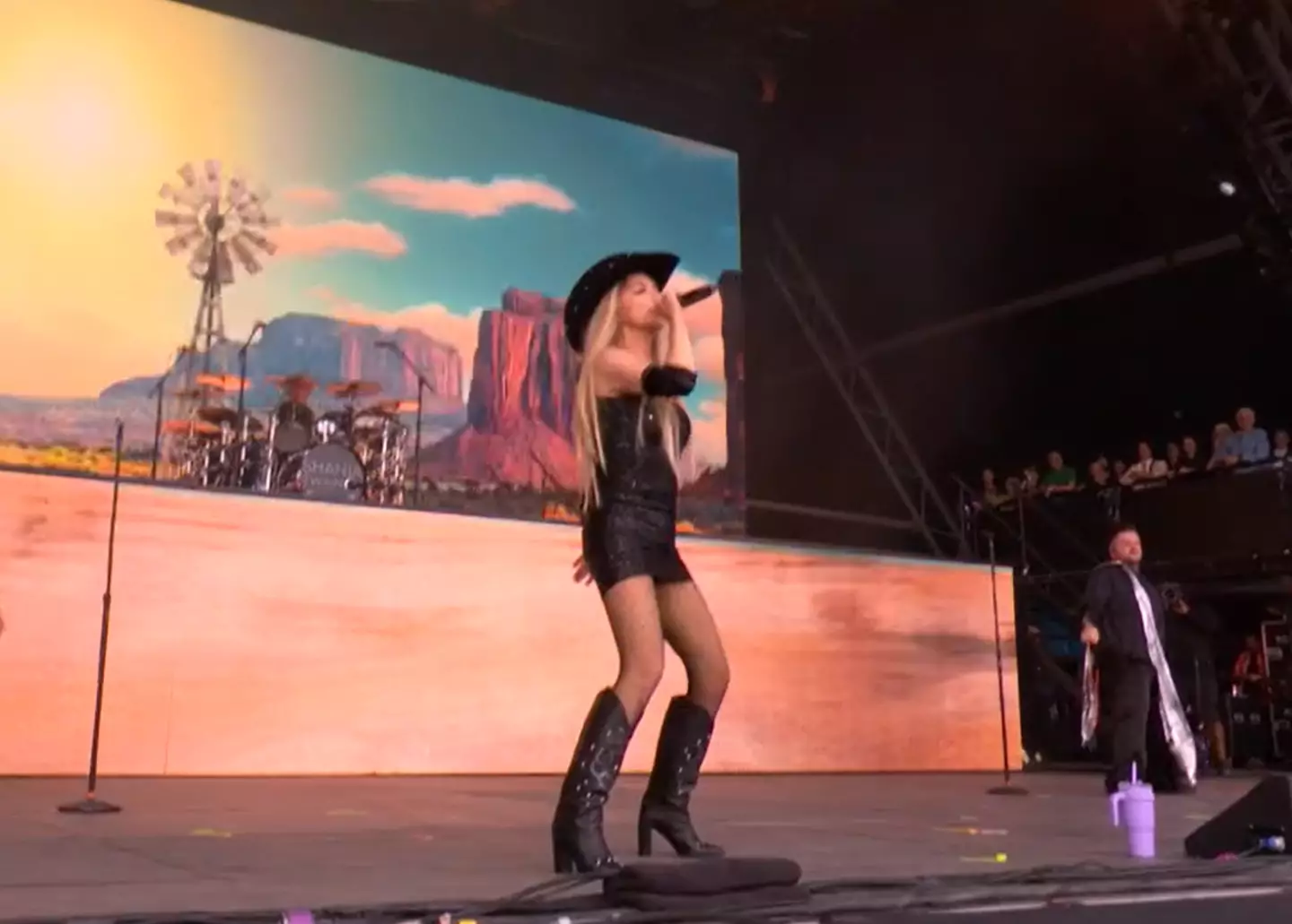 Shania Twain appeared to fiddle with her mic pack a few times, leading some to fear a technical issue. (BBC)