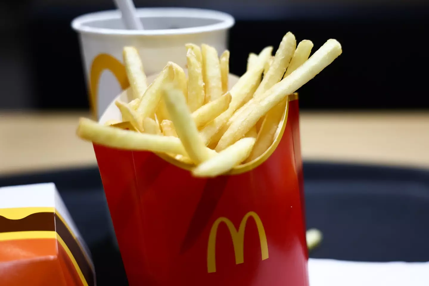 Fries and coke have the caffeine, carbs and salt to take the edge off a migraine, but there are far better options out there (Jakub Porzycki/NurPhoto via Getty Images)