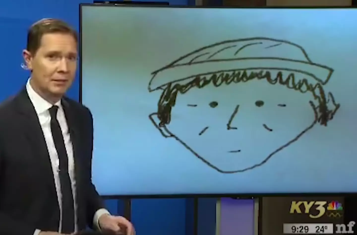 The news reporter comically looked at the camera, not knowing how to react.