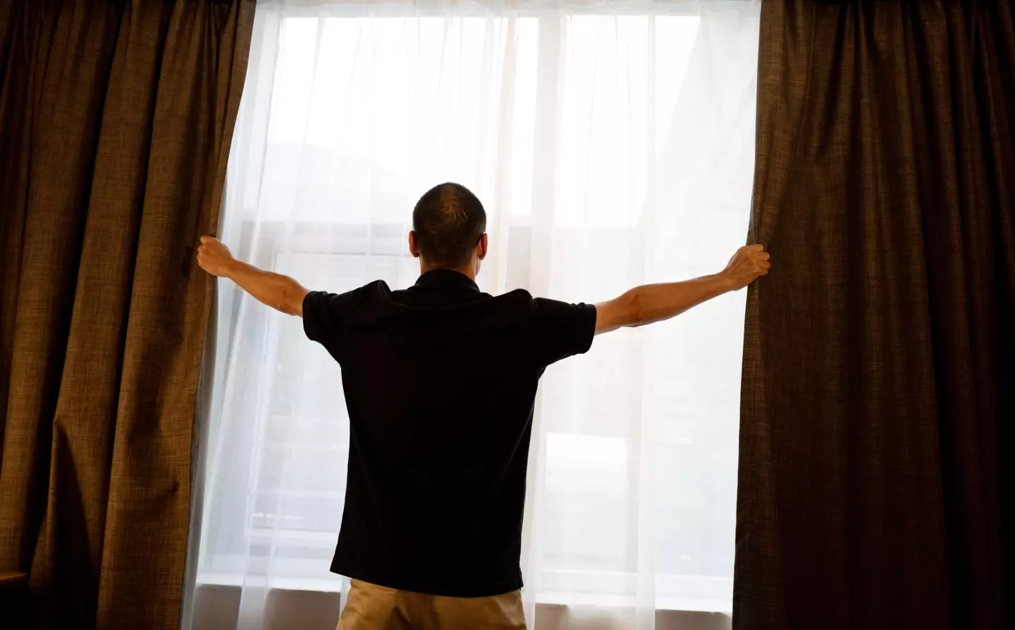 Closing the curtains will help keep the heat in (Getty Stock Image)