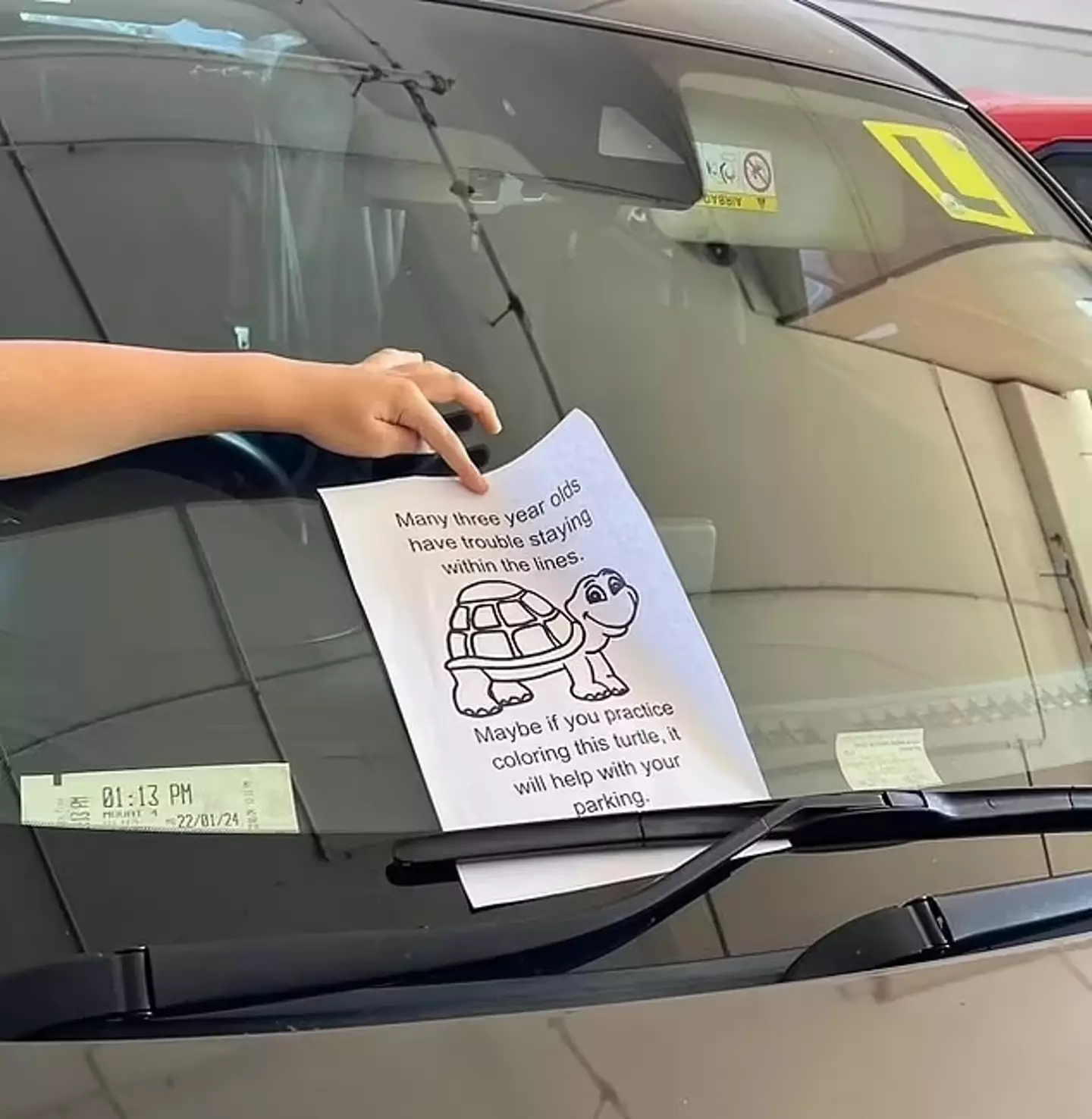 The note in question was left on the windscreen of a Mazda sedan parked at the Galleria Shopping Centre in Morley, Australia.