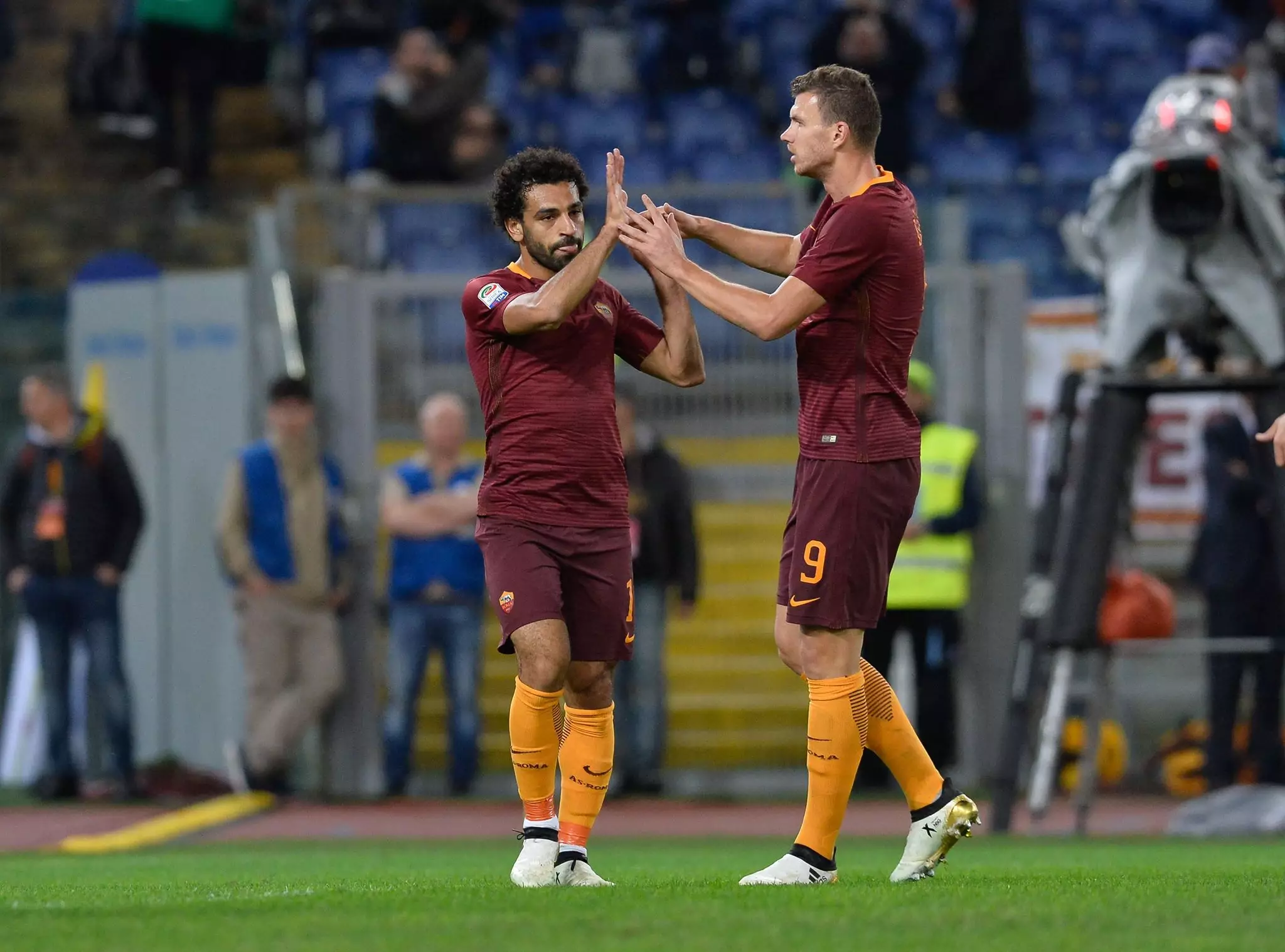 Salah and Dzeko celebrate scoring a goal for AS Roma. Image: PA