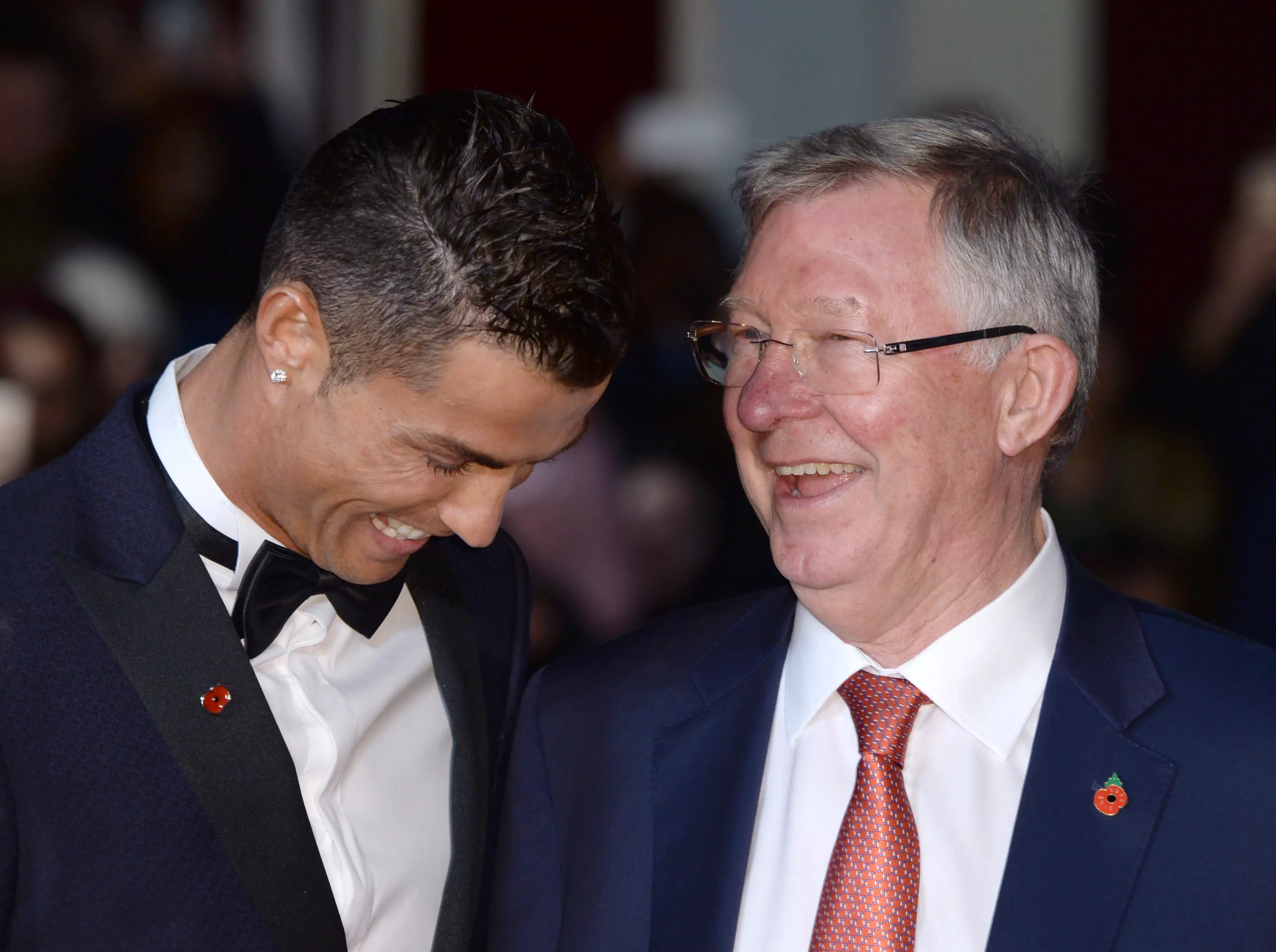 Ronaldo and Fergie laugh about Ronaldo's need to defend. Image: PA Images