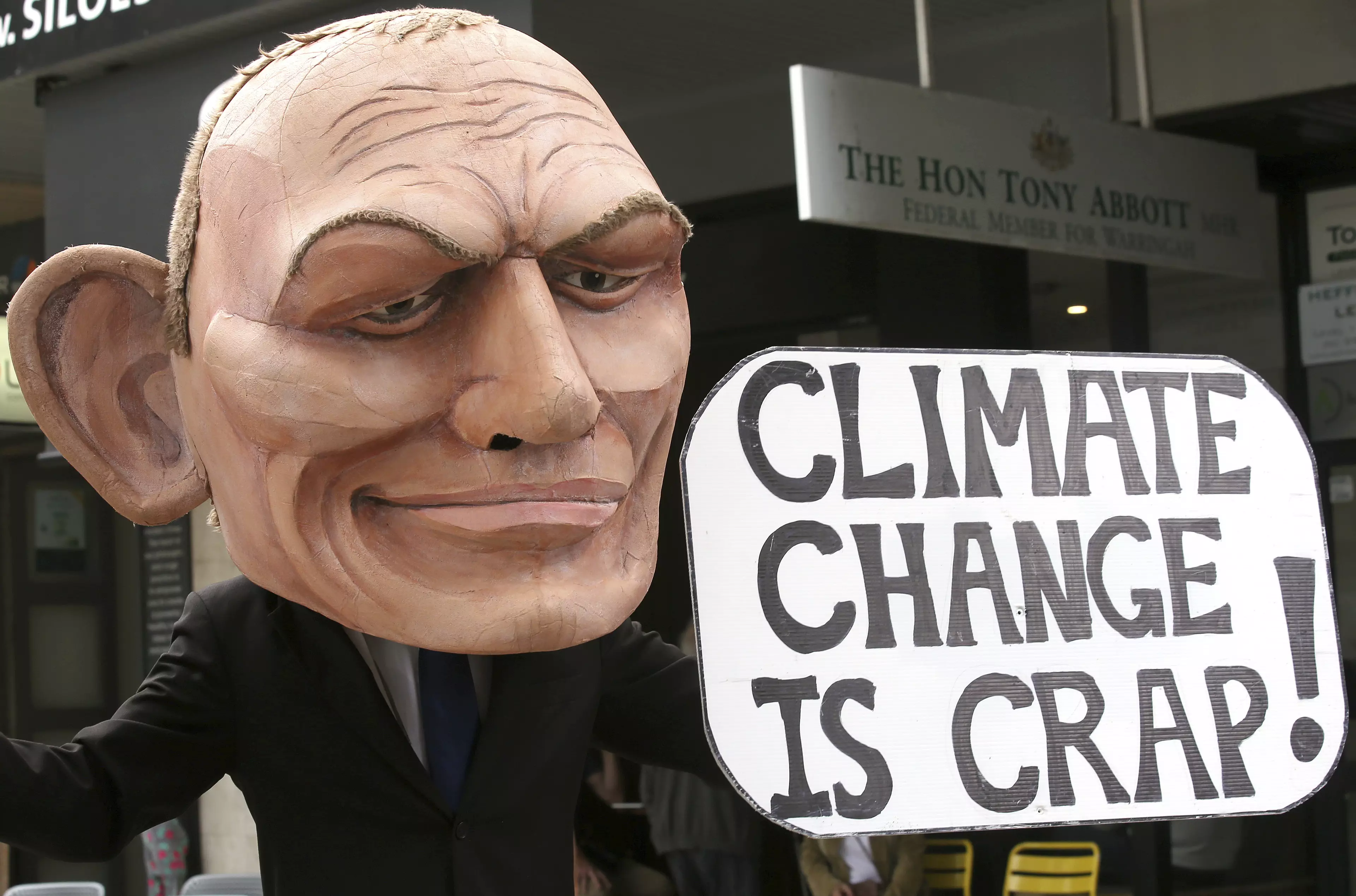 Protestor outside Mr Abbott's office.