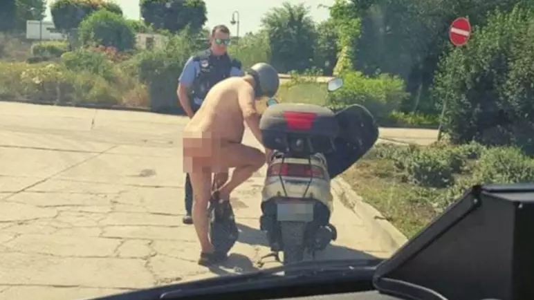 Police Stop Man Riding Scooter Naked Because He Was 'Too Hot'